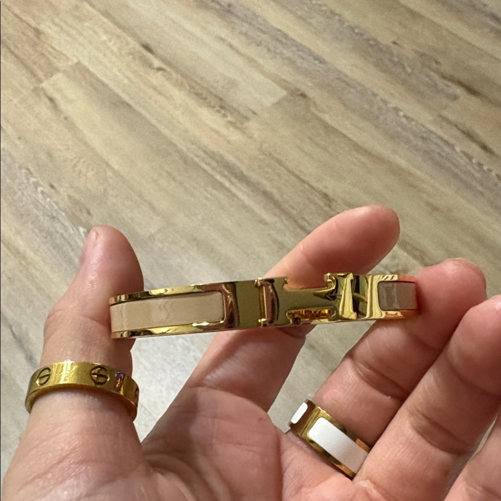 Hermes bracelets tan and gold